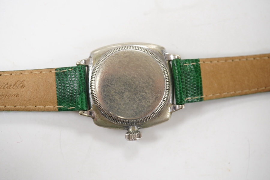 A gentleman's 1930's stainless steel Oyster Watch Co. manual wind wrist watch, with Arabic dial and subsidiary seconds, case diameter 30mm, on a later associated leather strap. Condition - poor